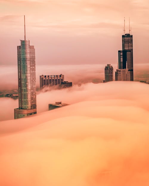 High Rise Buildings Covered With Dense Fog