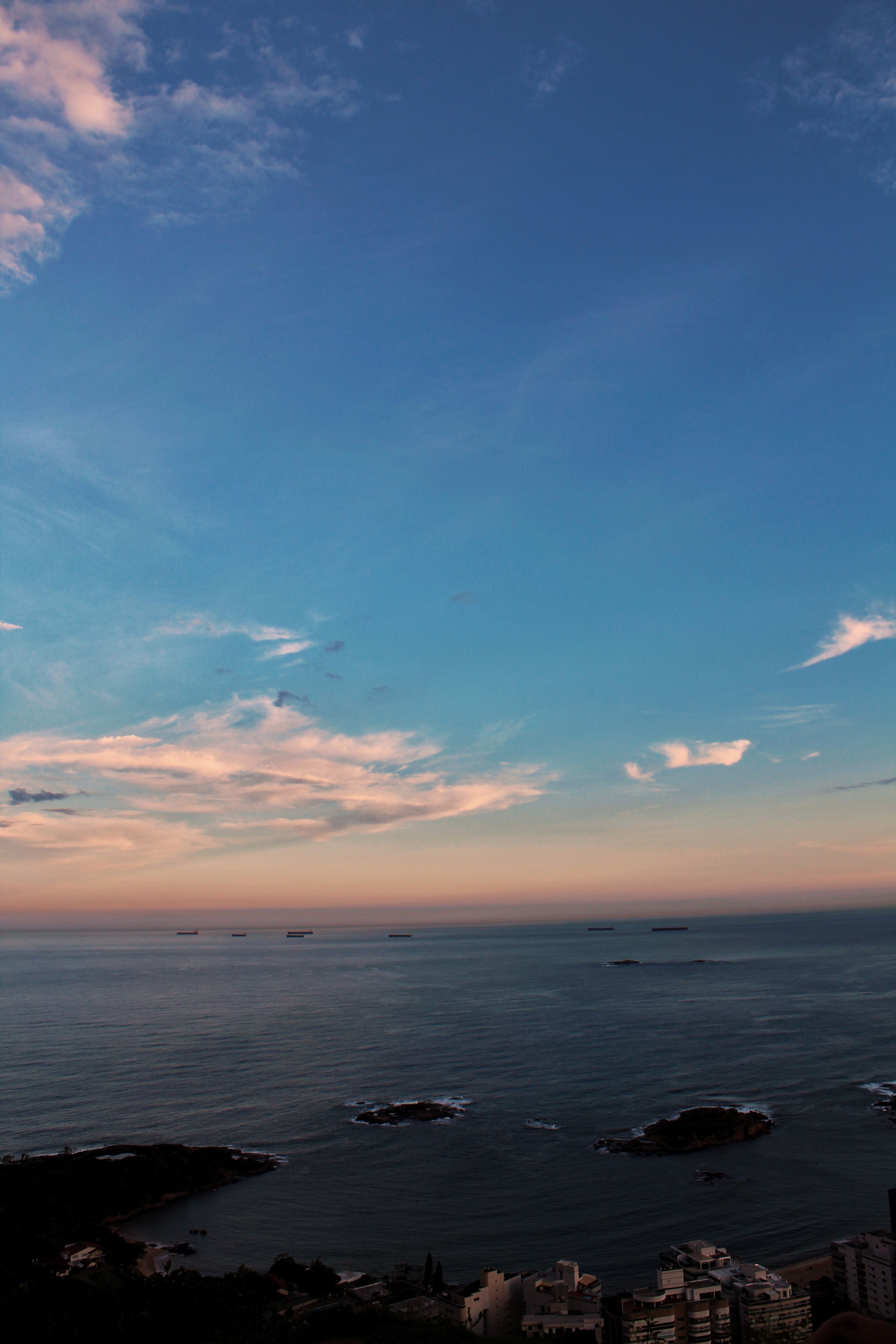 Blue Sky and White Clouds Over the Sea · Free Stock Photo