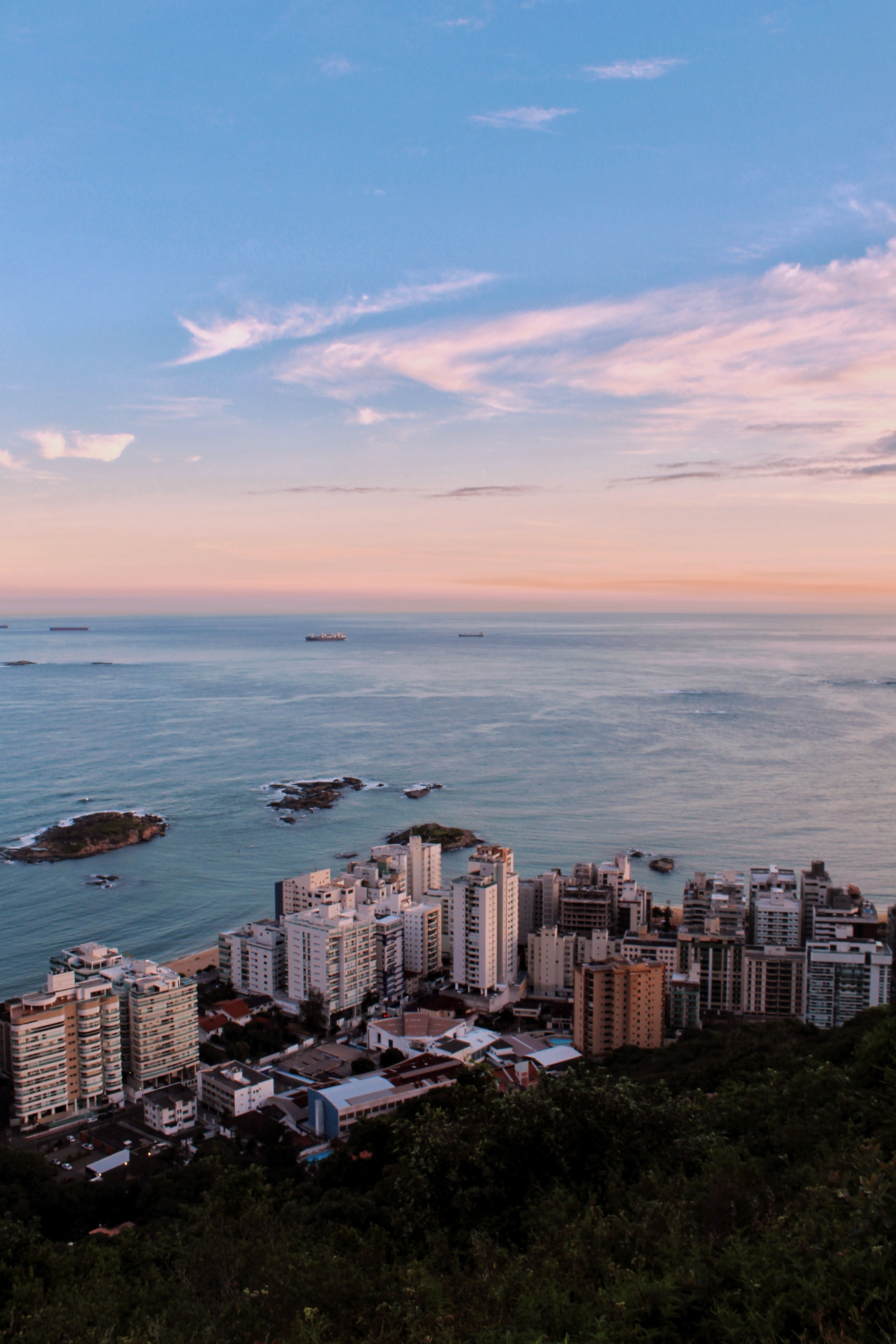 Aerial View of City Buildings Near Sea · Free Stock Photo