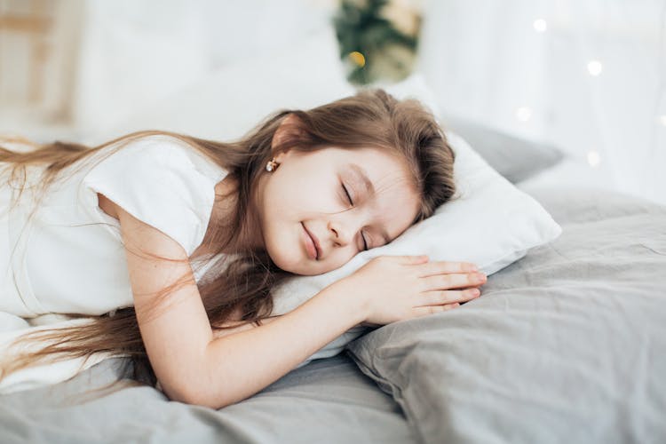 Girl Sleeping In Bed