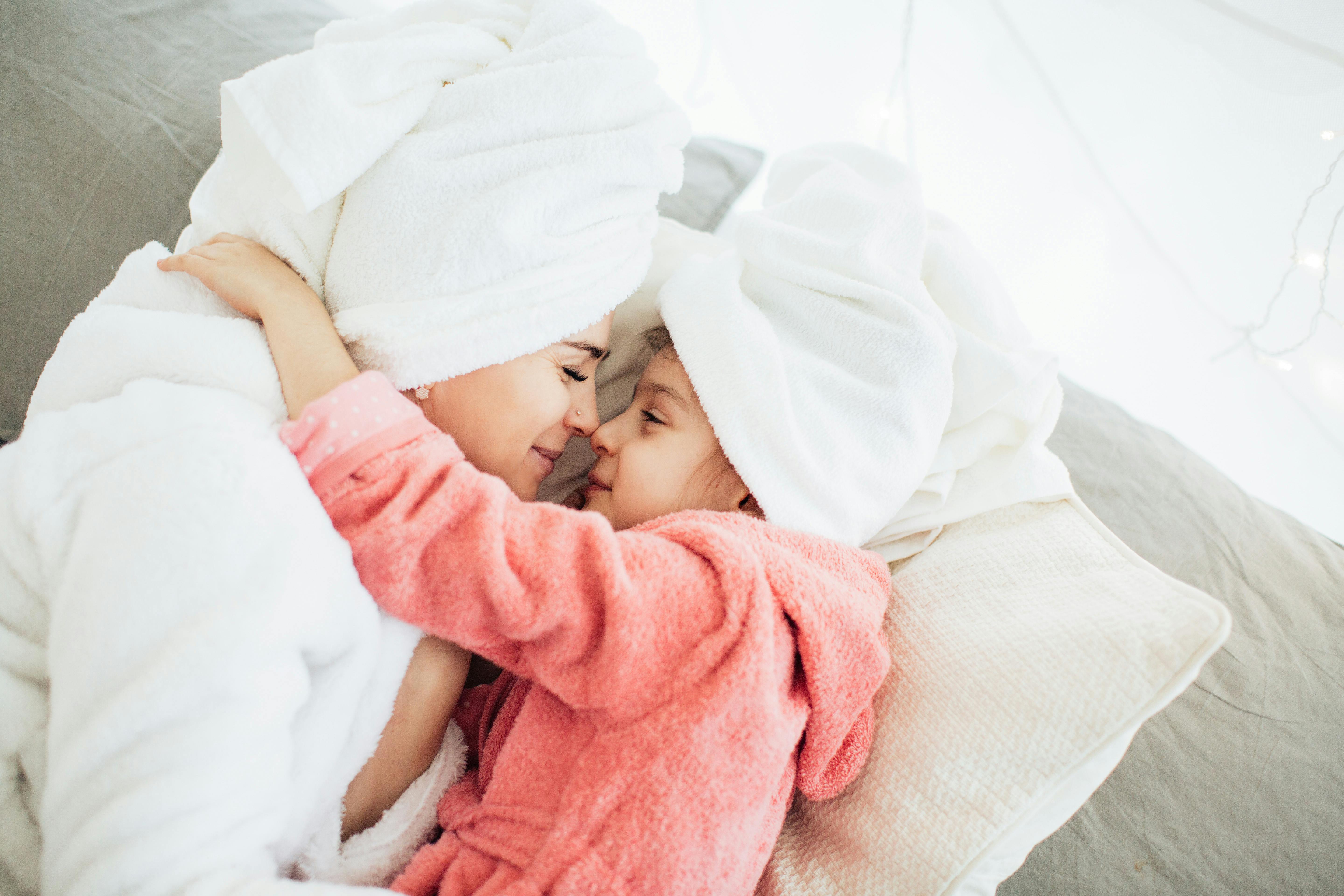 daughter embracing mother