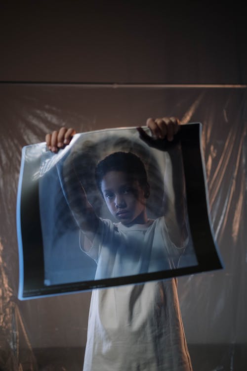 Free Child Holding a X-ray Film Stock Photo