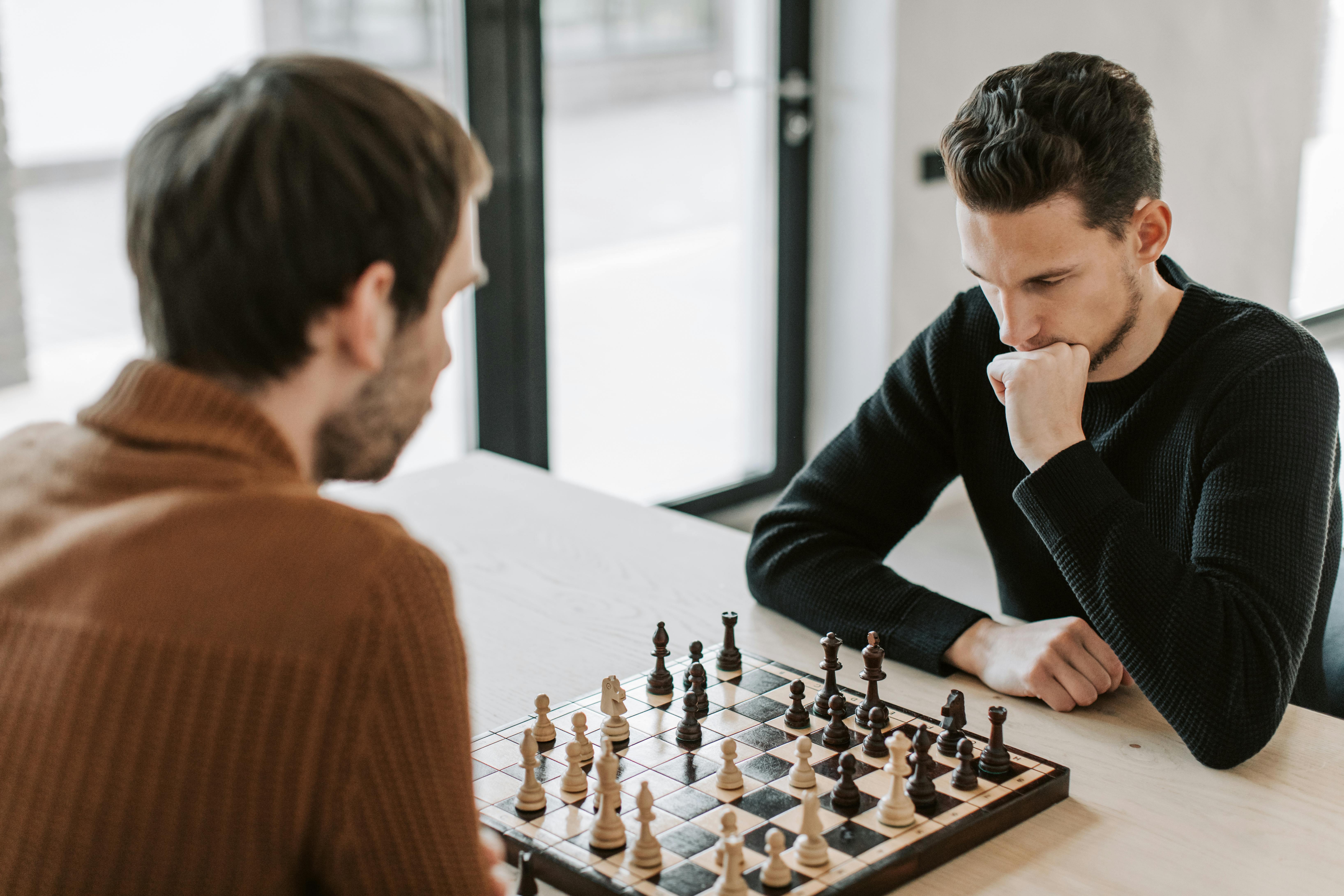 Chess Players. Two Men Play A Chess Stock Photo, Picture and Royalty Free  Image. Image 7563168.