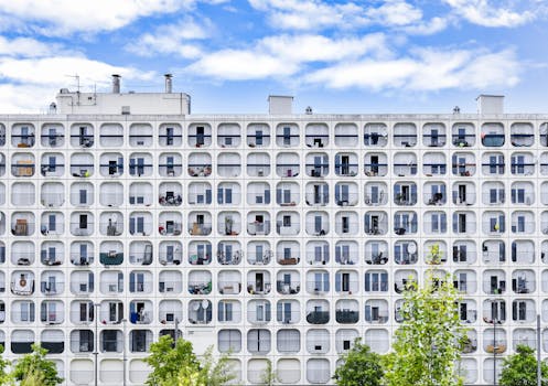 Explore the unique and modern architectural facade of apartments in Bordeaux, France.