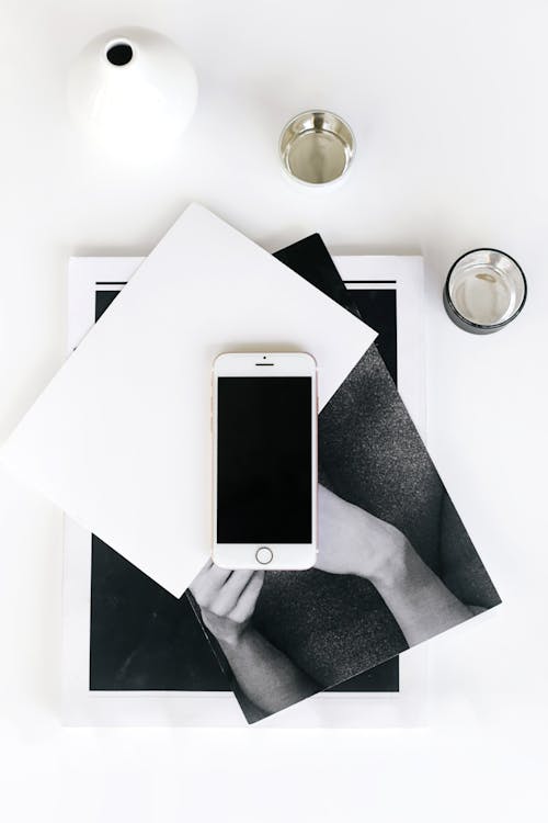 Free Silver Iphone 6 on White Table Stock Photo
