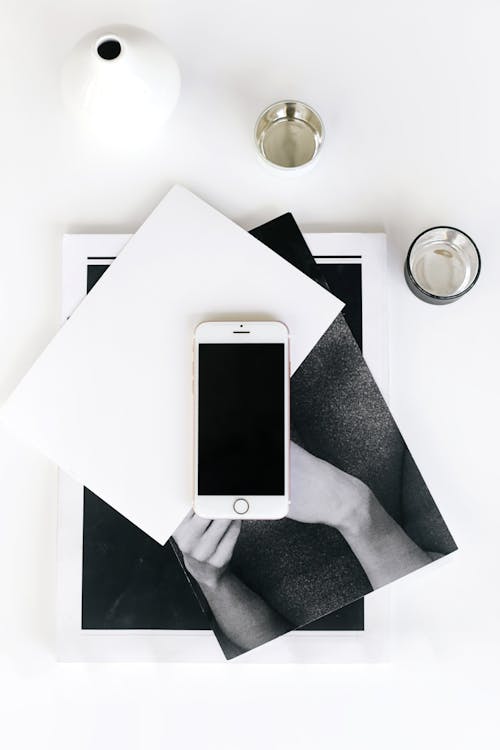 Silver Iphone 6 on White Table