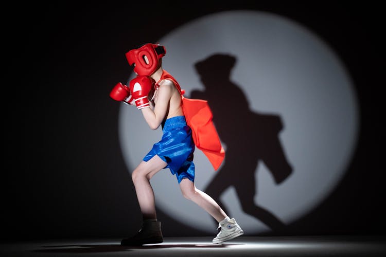 Shirtless Child Shadow Boxing