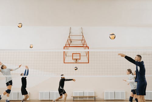 Free Volleyball Player Training on the Court Stock Photo