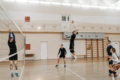 Free People Playing Volleyball Game Stock Photo