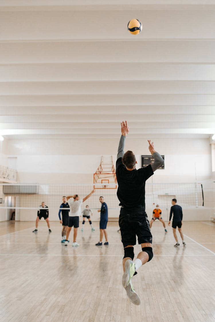 Photo Of People Playing Volleyball