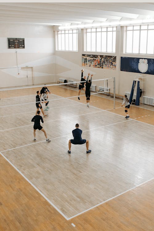 Volleyball Players Training Together