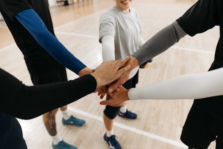 Group Of People Showing Support And Teamwork