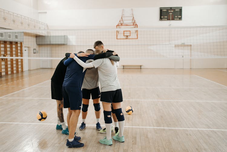 Teammates In A Huddle