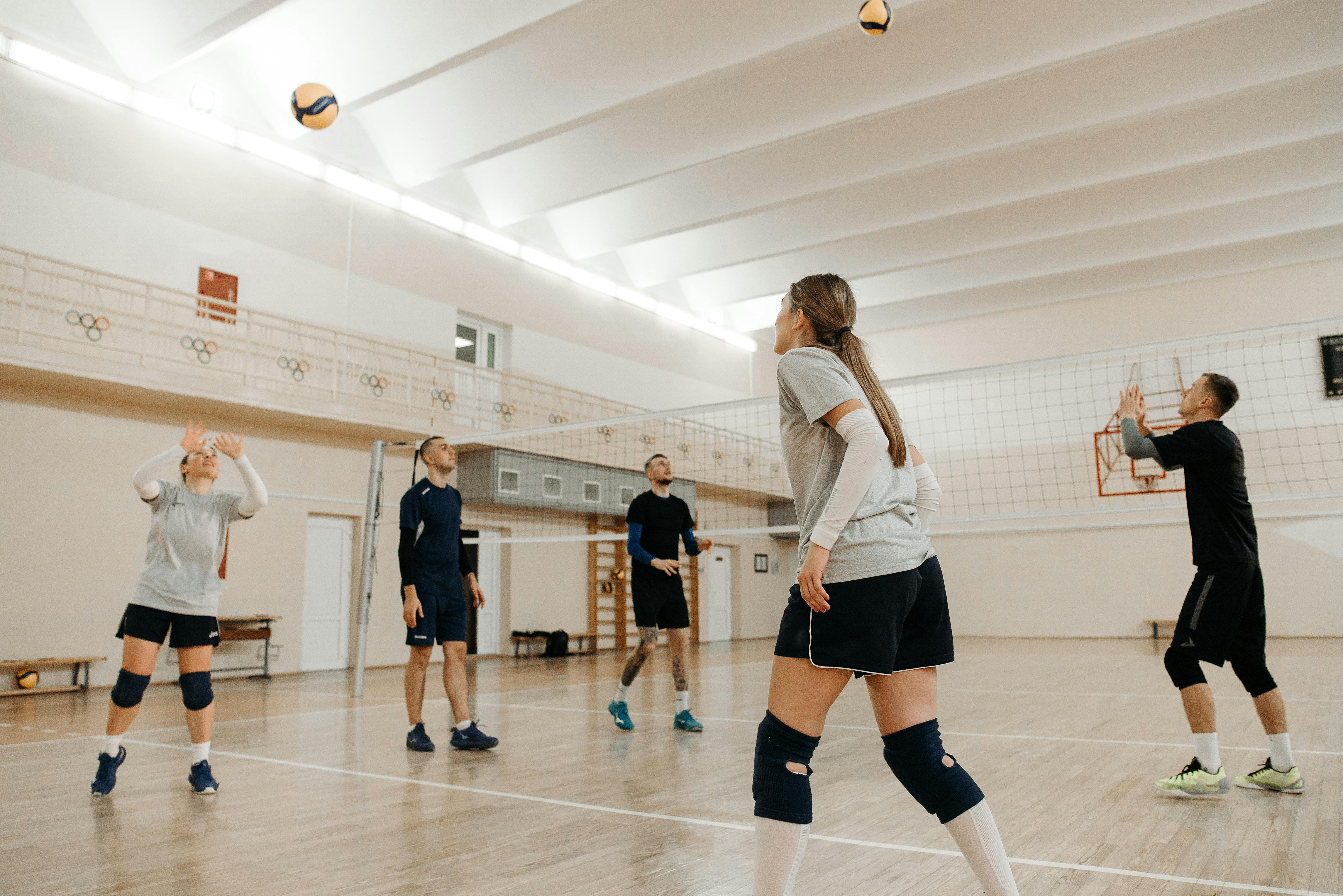 volleyball players training together