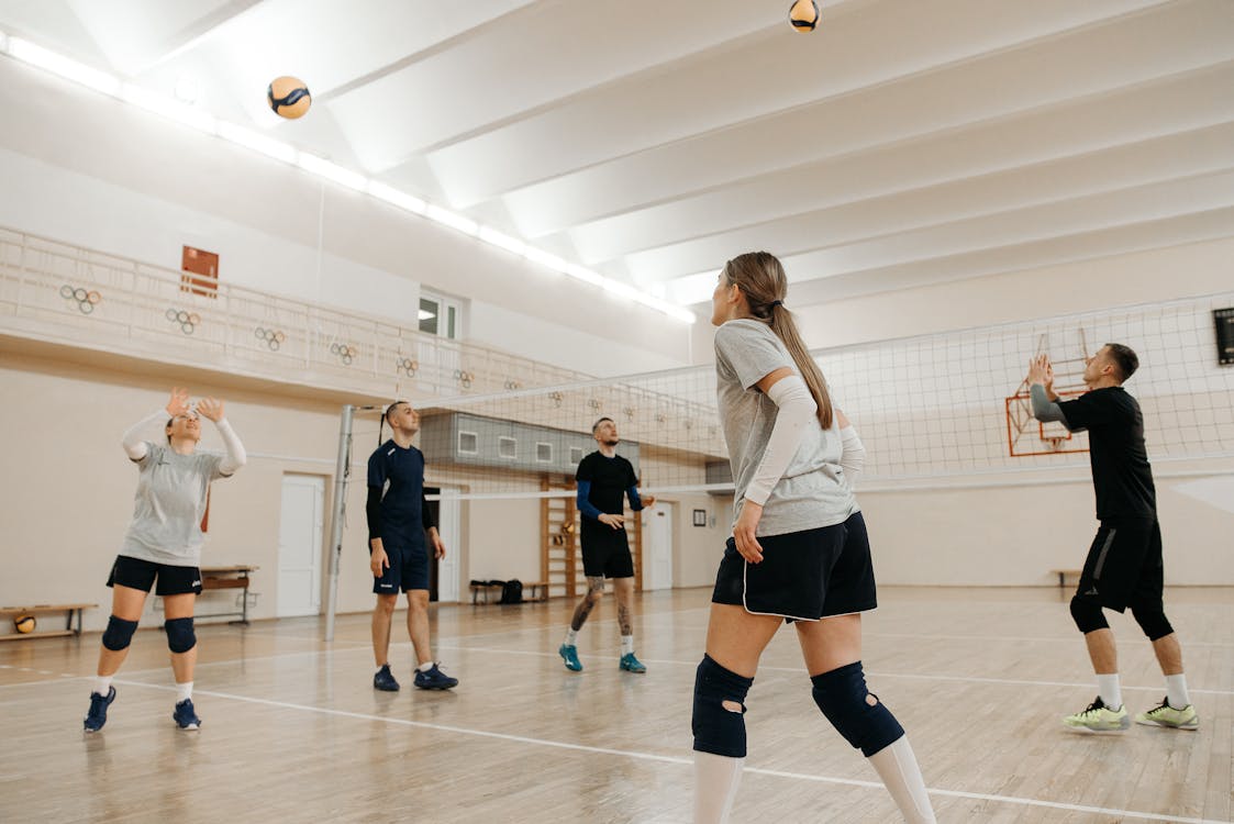Volleyball Players Training Together