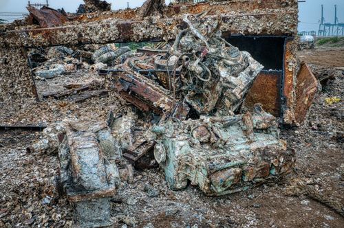 Free Pile of weathered metal litter stored in landfill polluting environment and damaging ecology Stock Photo