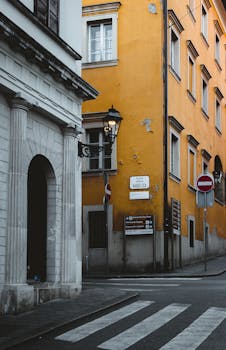 Attractive architecture and street signs at a corner in Zagreb, Croatia, showcasing classic European style.