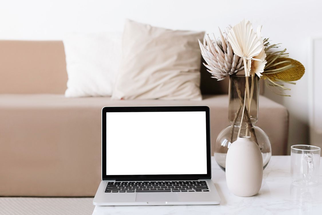 Macbook Pro on White Table · Free Stock Photo