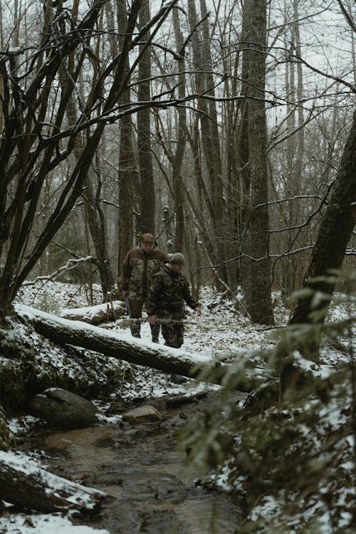 Two Men Walking in the Woods