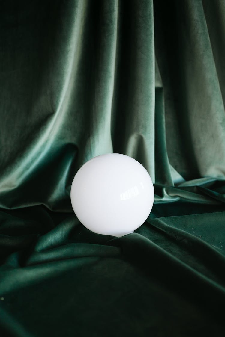 Crystal Ball On Green Fabric