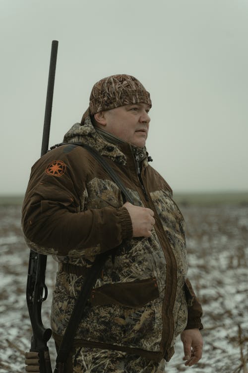 Photo of a Hunter Wearing Camouflage Clothes