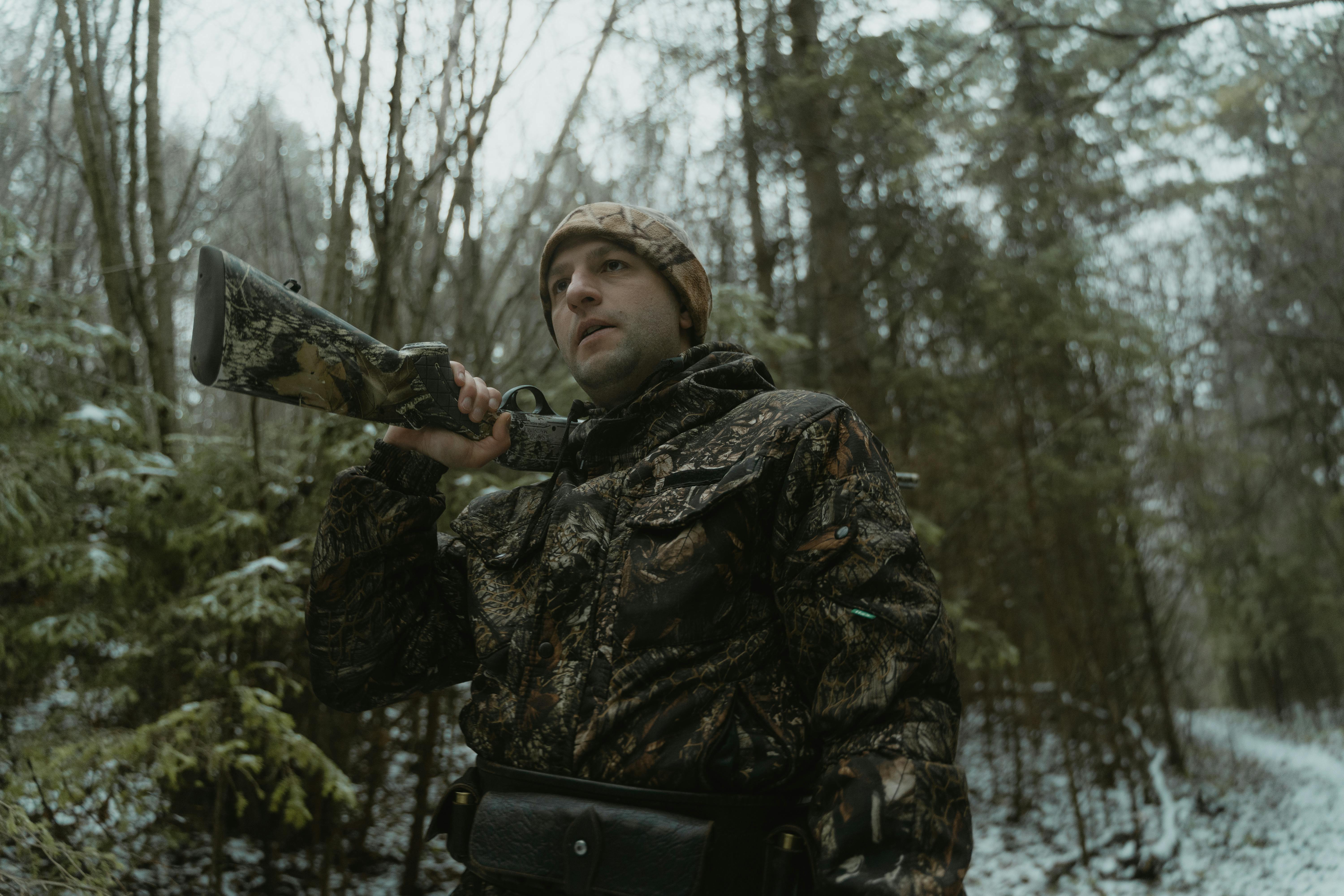 Hunter in Camouflage Clothing with a Gun in a Case Drinking Tea from a  Thermos Stock Image - Image of hand, equipment: 165288499