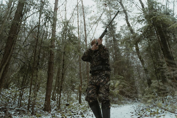 Man Hunting In A Forest