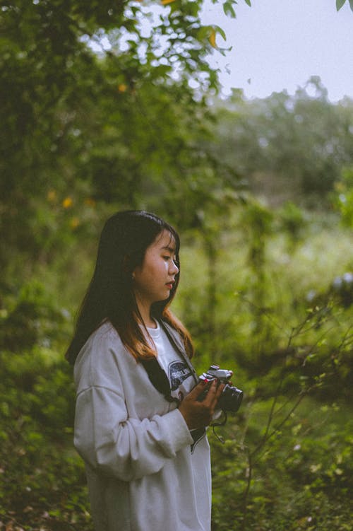 Portrait of a Woman with a Camera