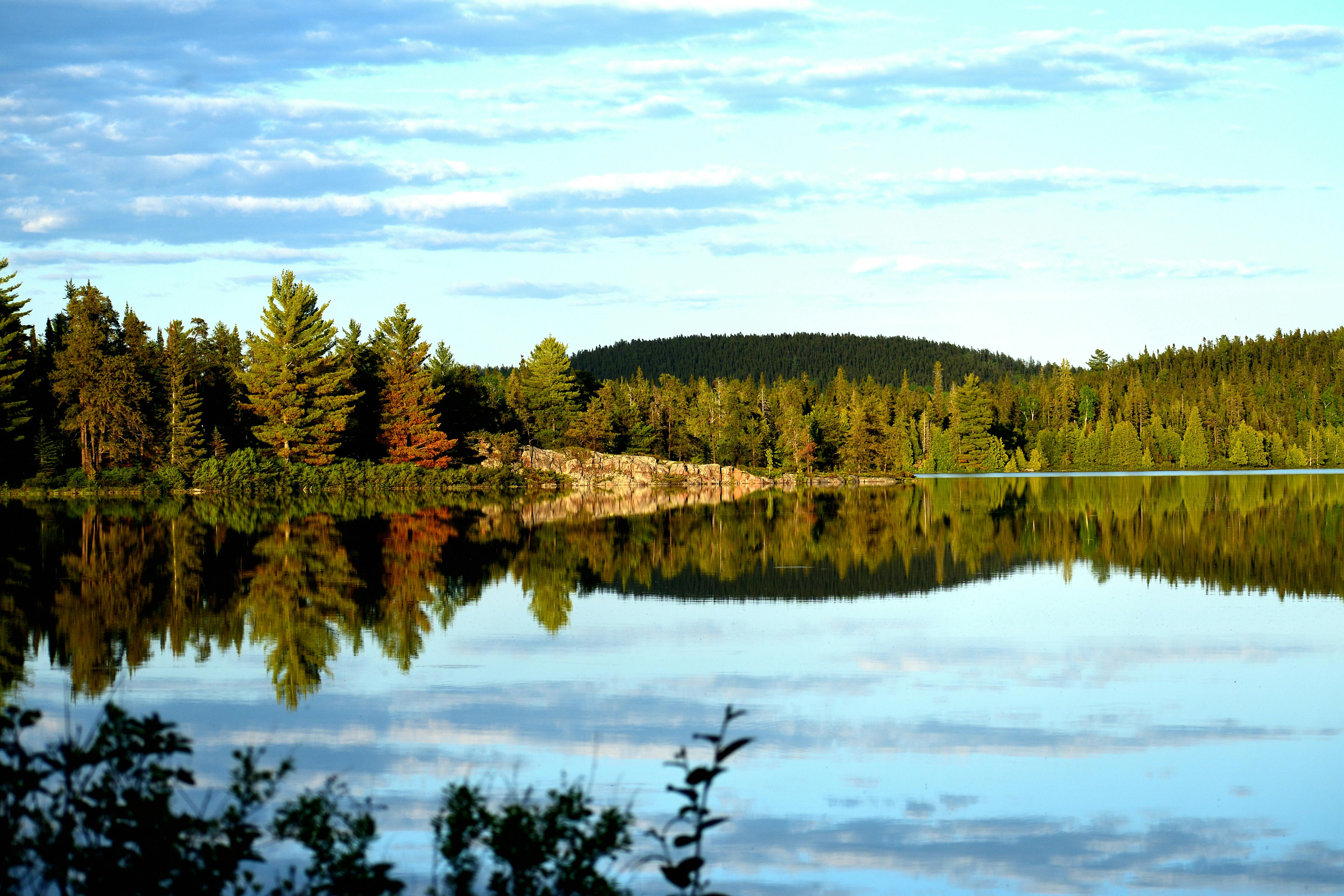 Photography of Mountains Near Body of Water · Free Stock Photo