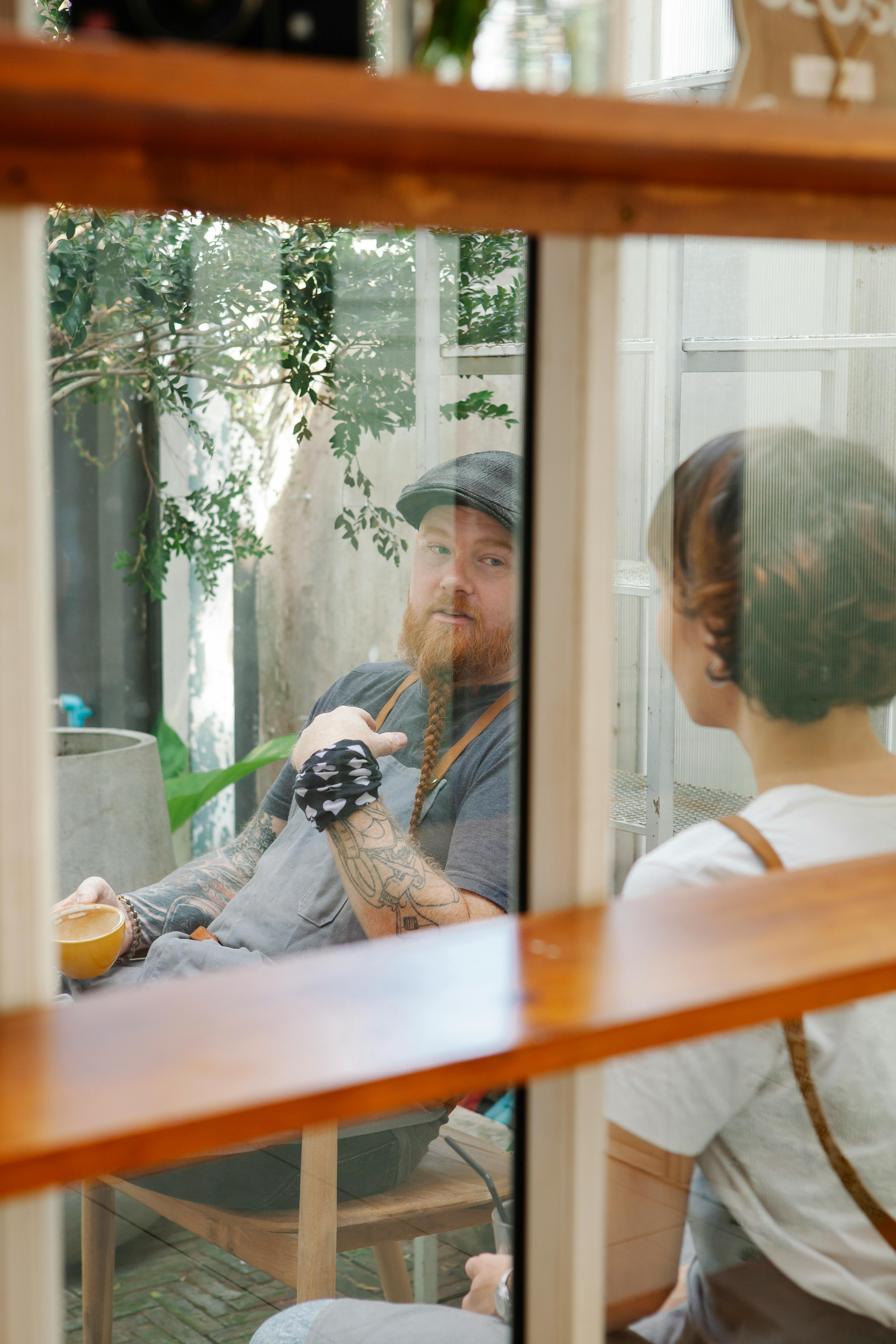 couple of colleagues having conversation in veranda