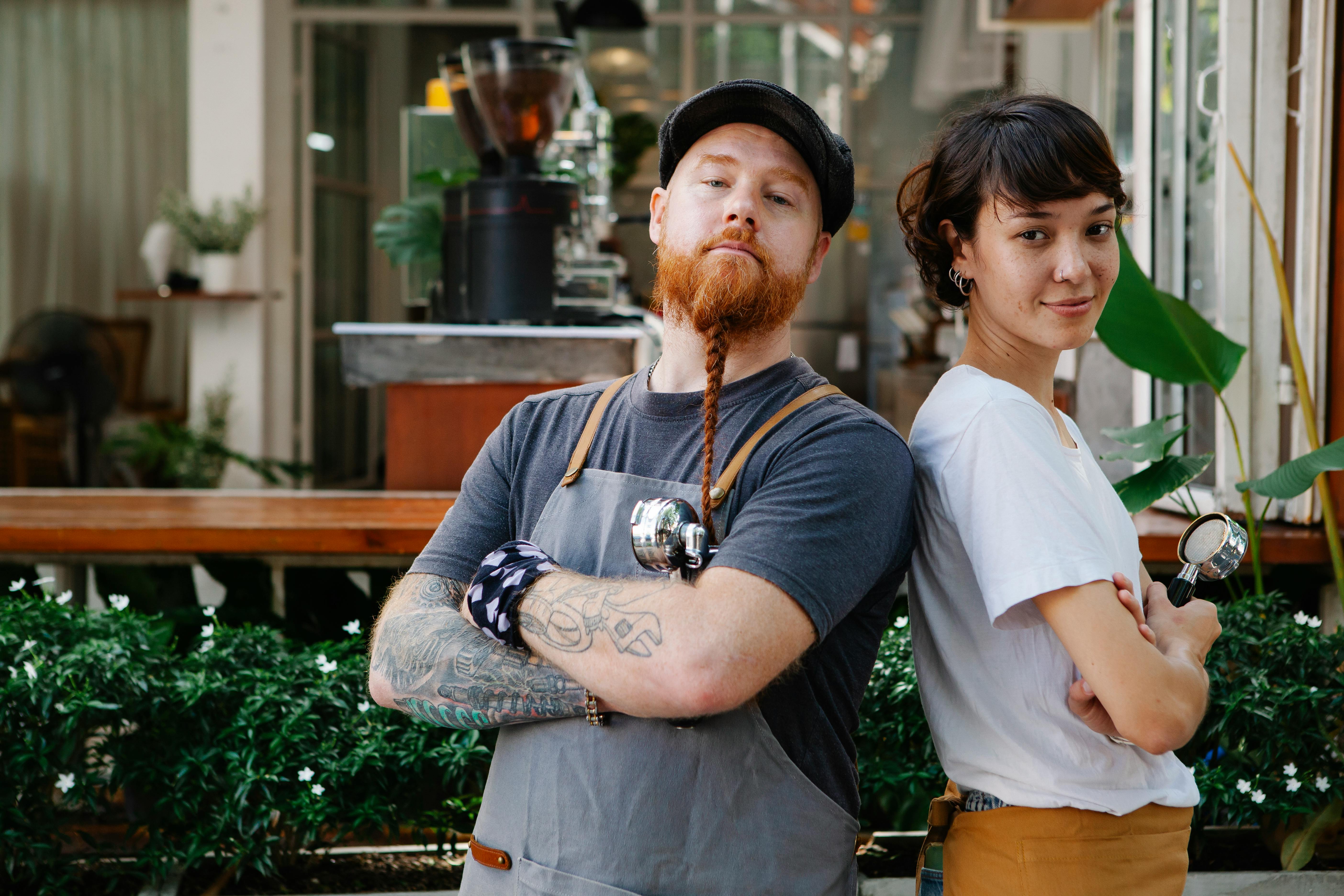 couple of colleagues spending time in street near cafeteria