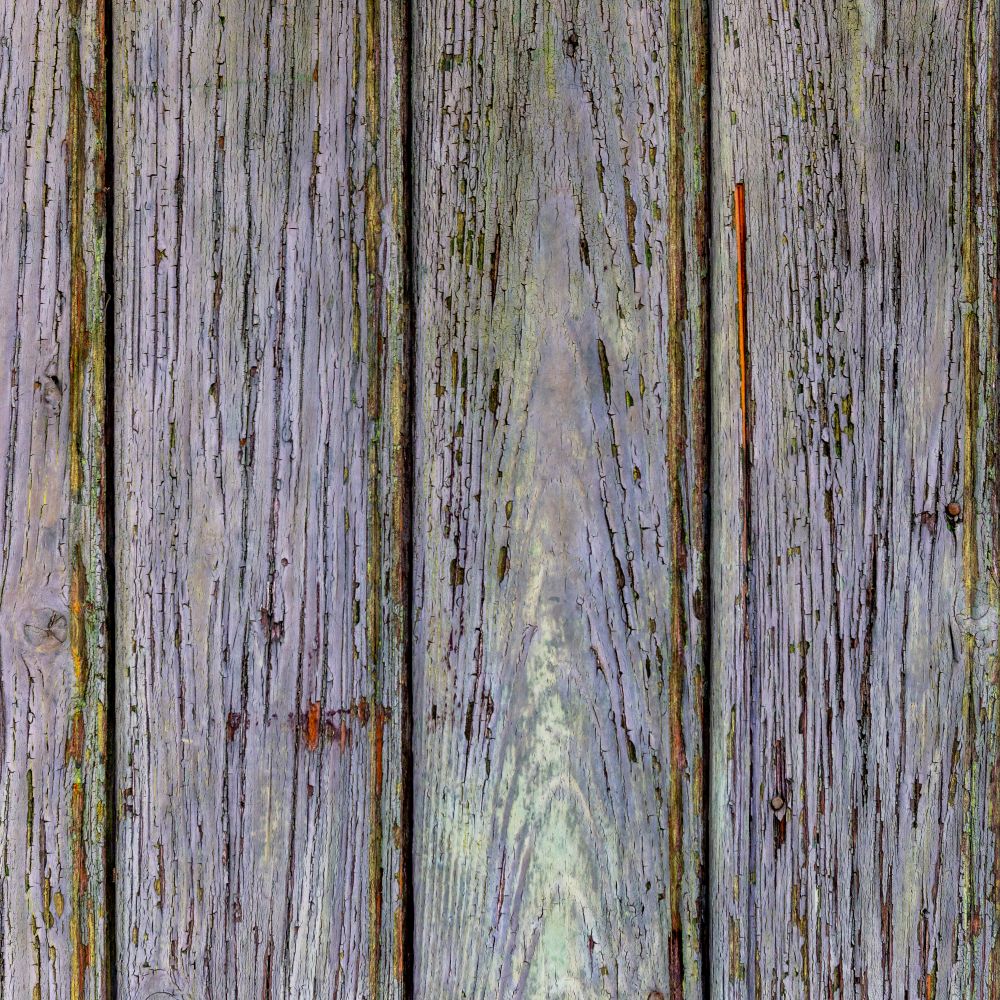 Fence and Decking Painting in Colney Hatch — a decorator at work mid-project