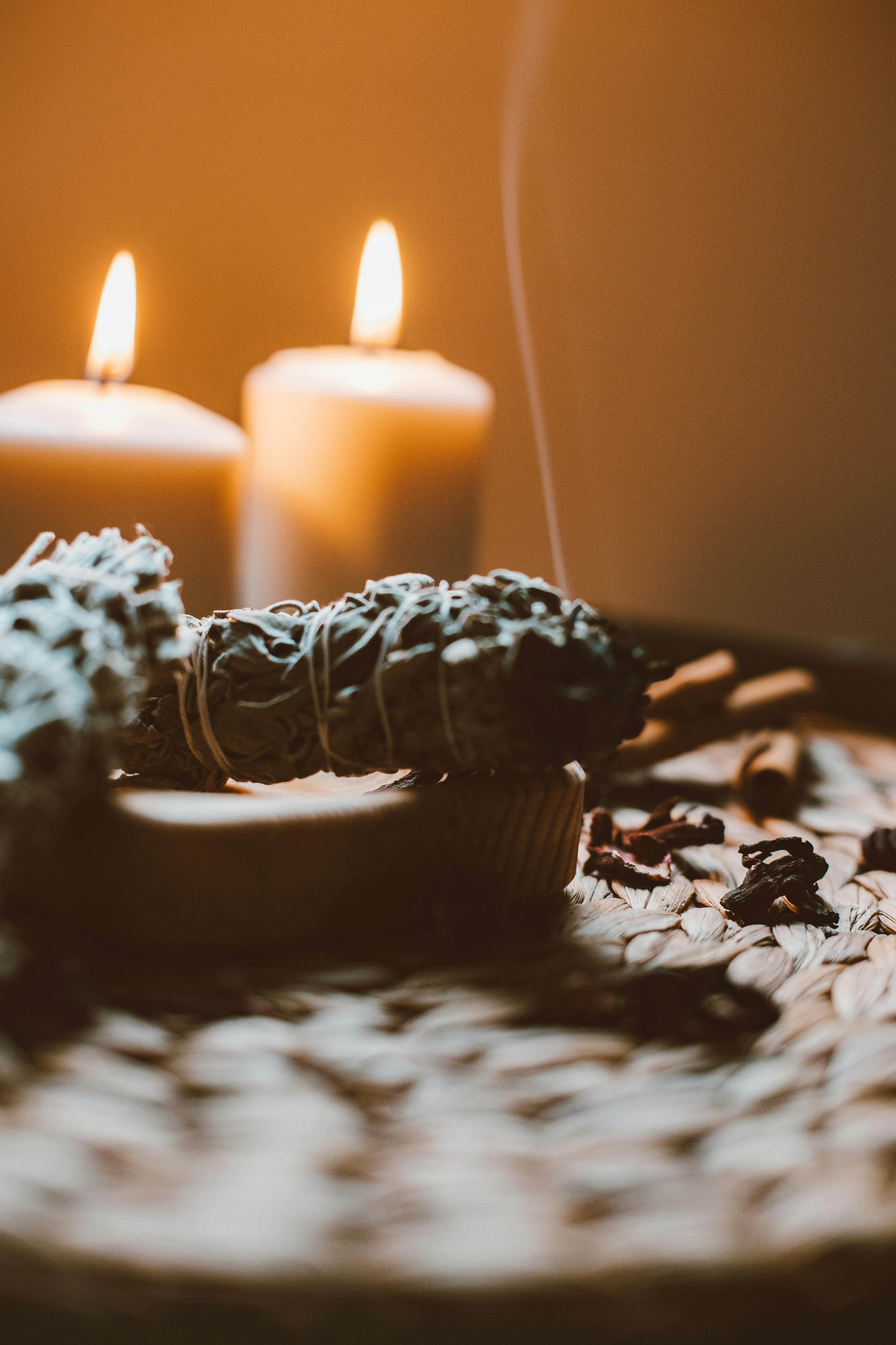 close up of aromatherapy with candles on table