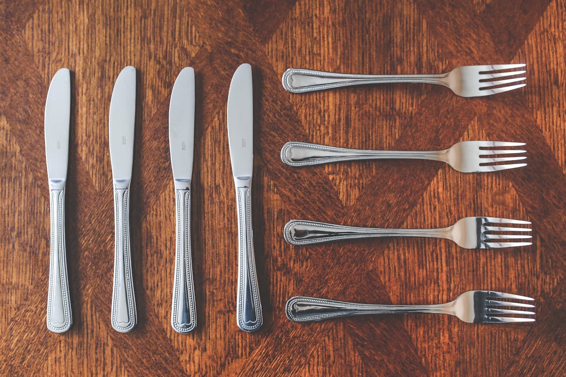 Free Cutlery: knives and forks Stock Photo