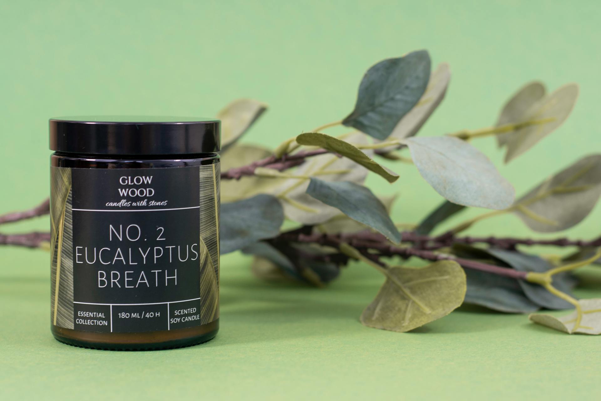 A Product Photography of Glow Wood Scented Candle of No. 2 Eucalyptus Breath Scent