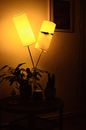 Stylish lamp illuminating dark room