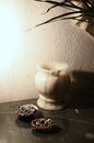 Table with onyx vase near bowls with jewelries