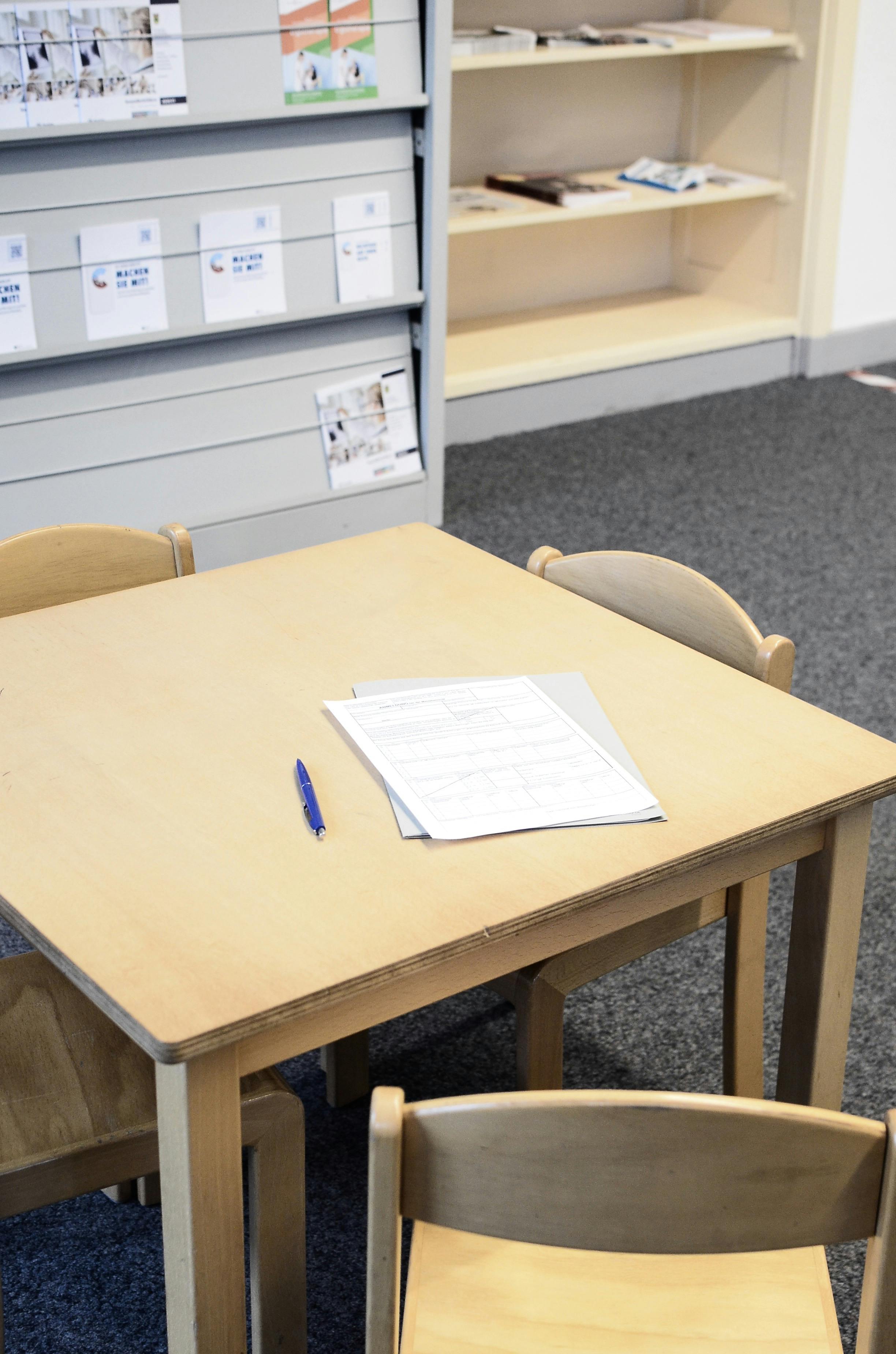 Traditional Chinese herbal roots and medicine on a table