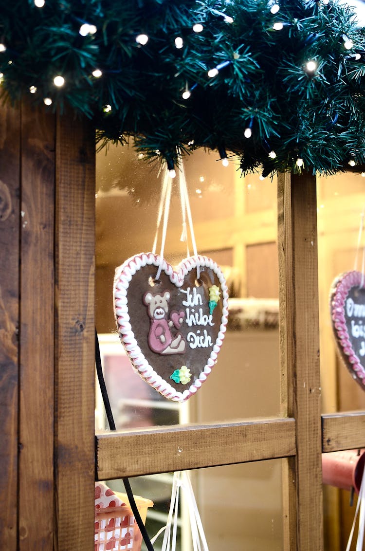 Christmas Decor With Shiny Garland On Window