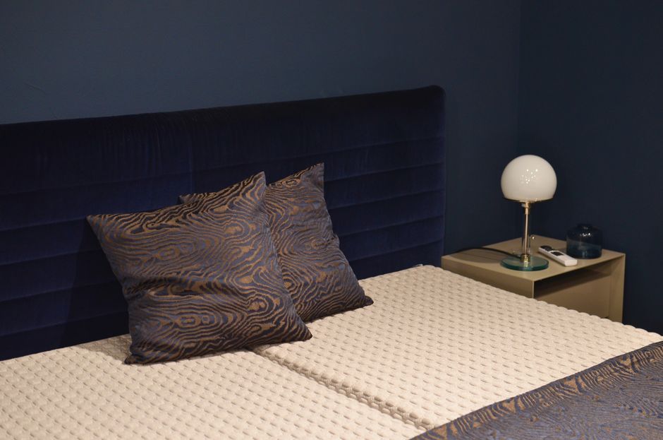 Buy Bedside Tables Delhi: A Guide to Space-Saving Furniture Solutions Traditional and modern bedside tables in a home decor store, Delhi, India