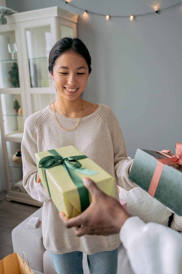 Smiling Woman Receiving Gift