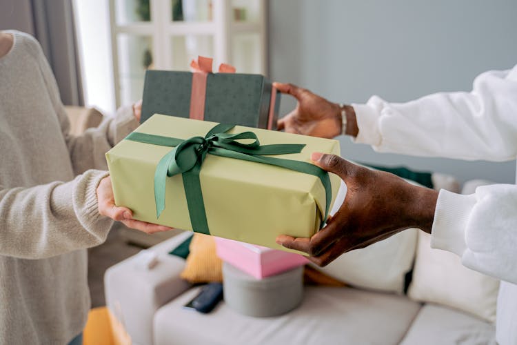 Two People Exchanging Gifts