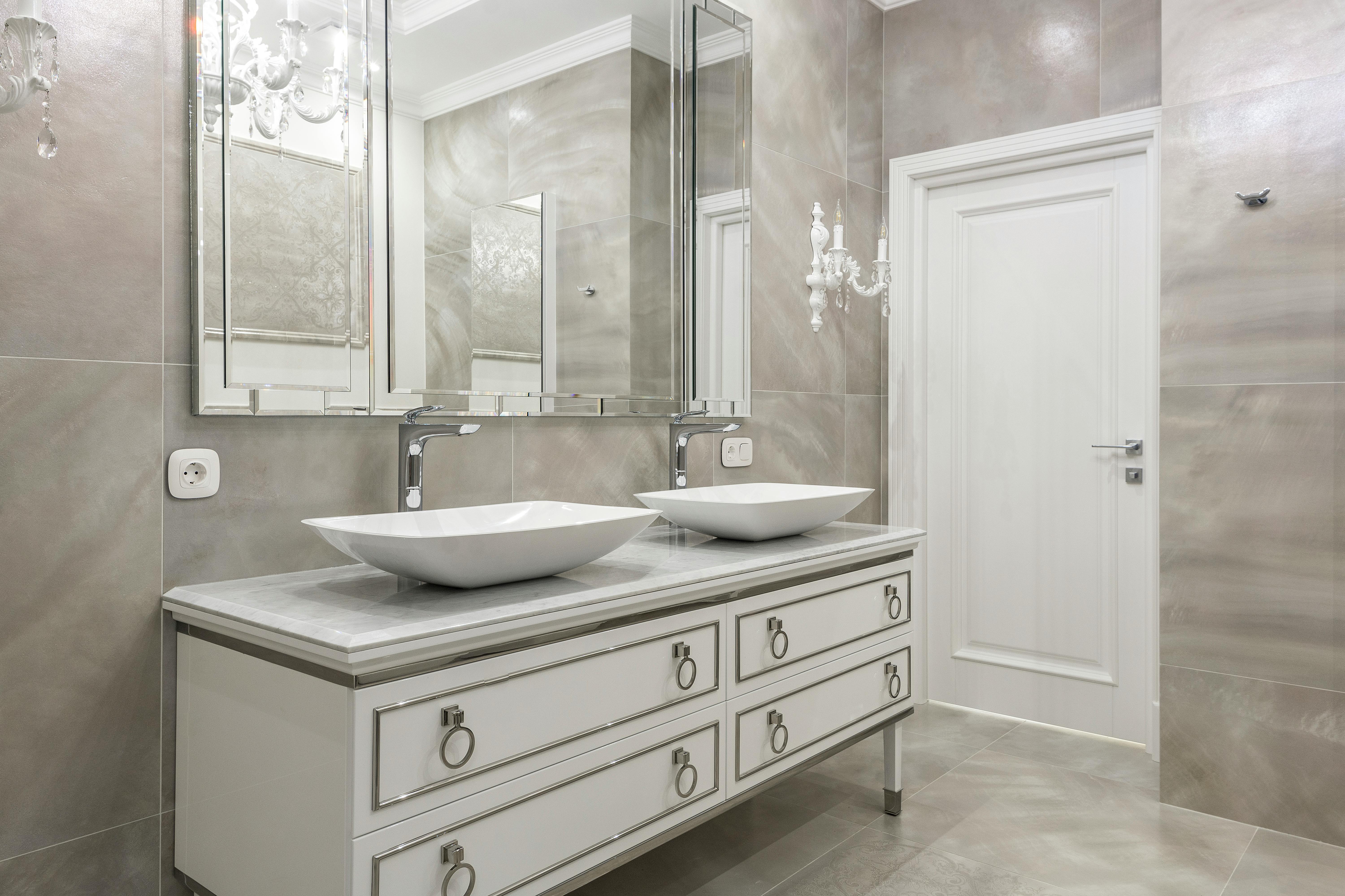 spacious bathroom with tiled walls and floor