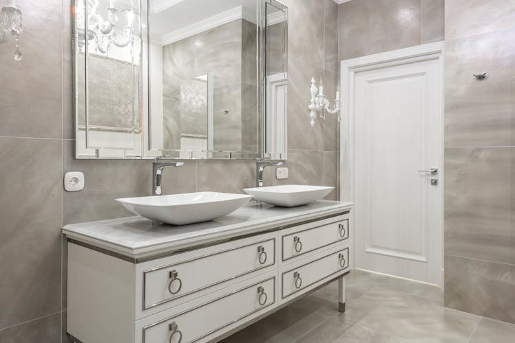 Spacious Bathroom With Tiled Walls And Floor