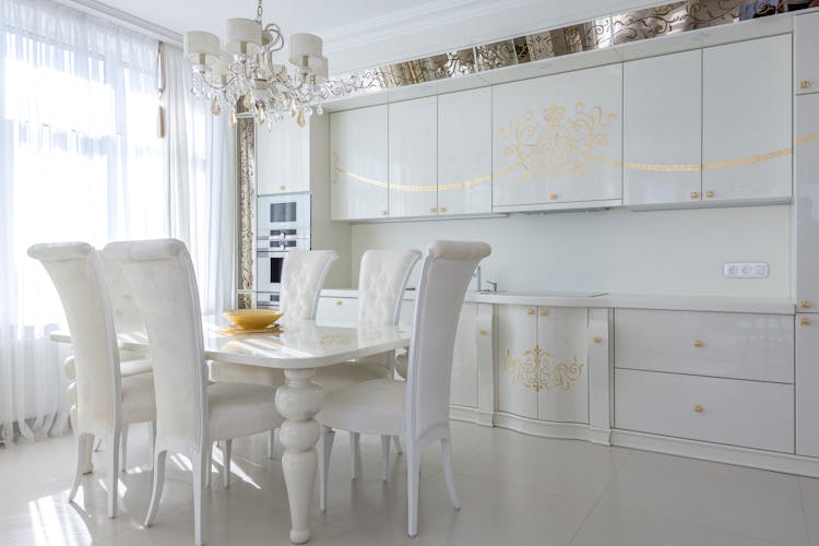 Interior Of White Kitchen In Classic Style