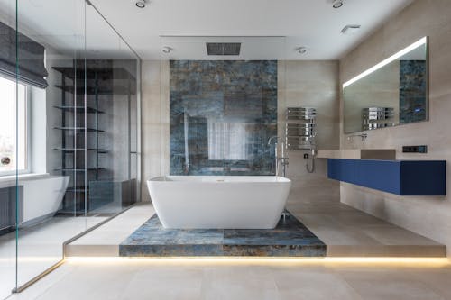 Free Modern bathroom interior with freestanding tub Stock Photo
