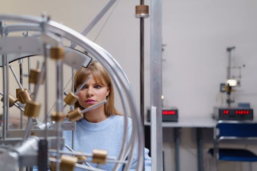Woman Staring at an Experiment
