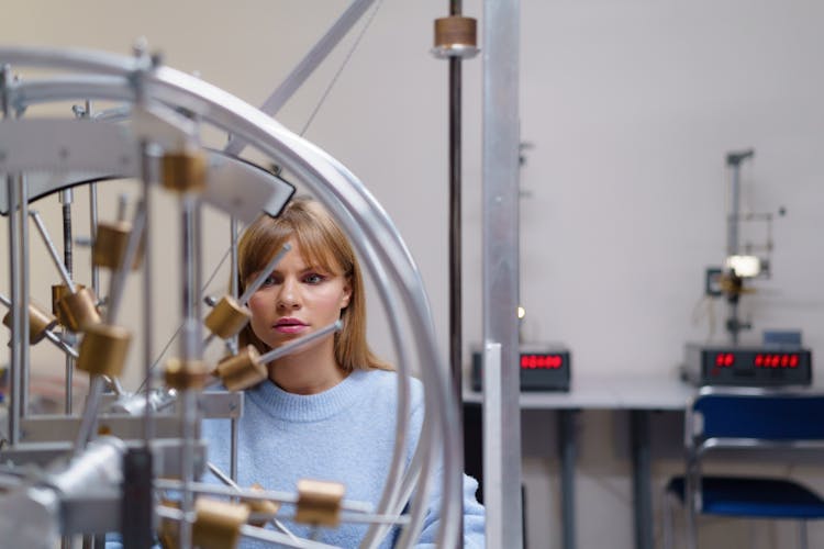 Woman Staring At An Experiment