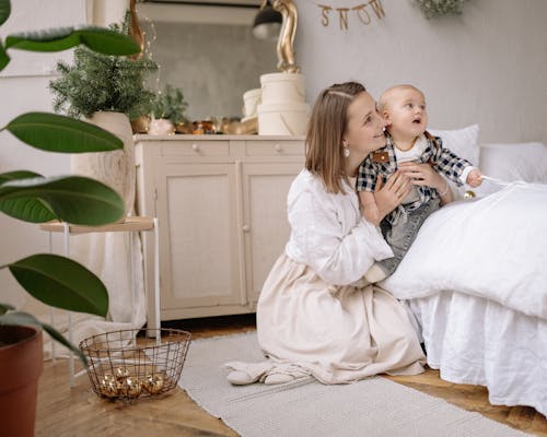 Free Mother Hugging Her Cute Son Stock Photo