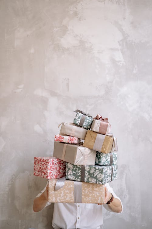 Free Person Carrying Gifts Stock Photo